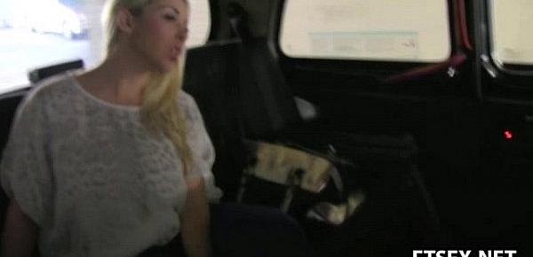  Busty blonde fucks in taxi